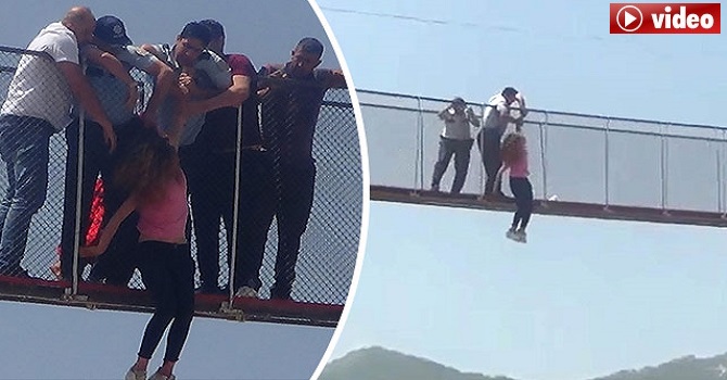 Köprüden atladı, polis havada yakaladı DHA-ÖZEL