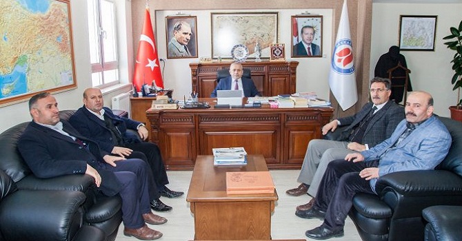 Başkan Er'den Rektör Pakiş'e ziyaret