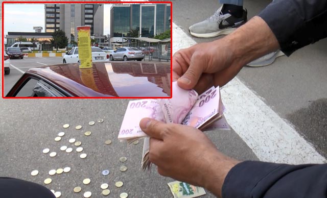 Aracının üzerinde para dolu cips kutusu buldu