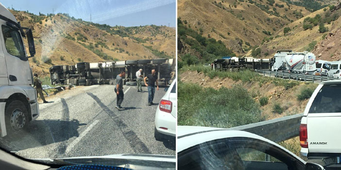 Yüksekova'da TIR, aracın üstüne devrildi